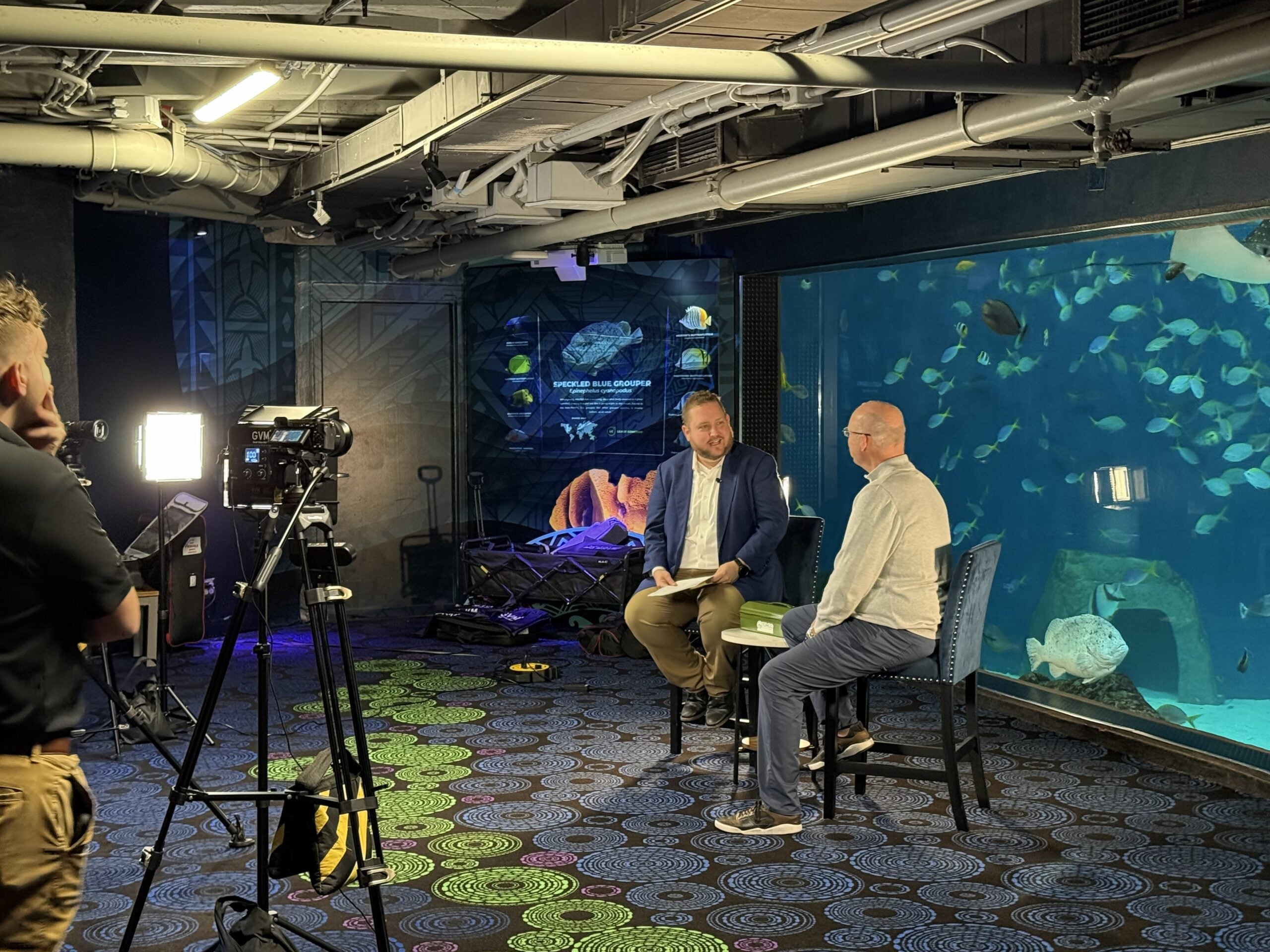 Behind the scenes at a Building Success Productions interview shoot inside the Florida Aquarium